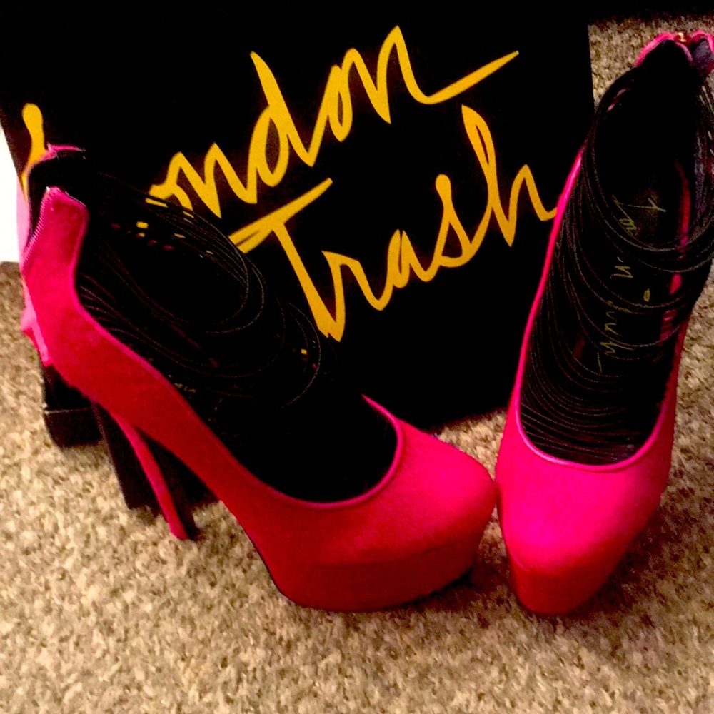 Platform pink fur heels.